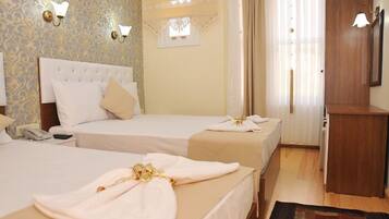 Standard Triple Room | Egyptian cotton sheets, premium bedding, pillowtop beds, in-room safe