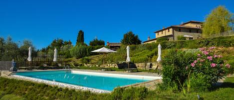 Outdoor pool, pool umbrellas, pool loungers