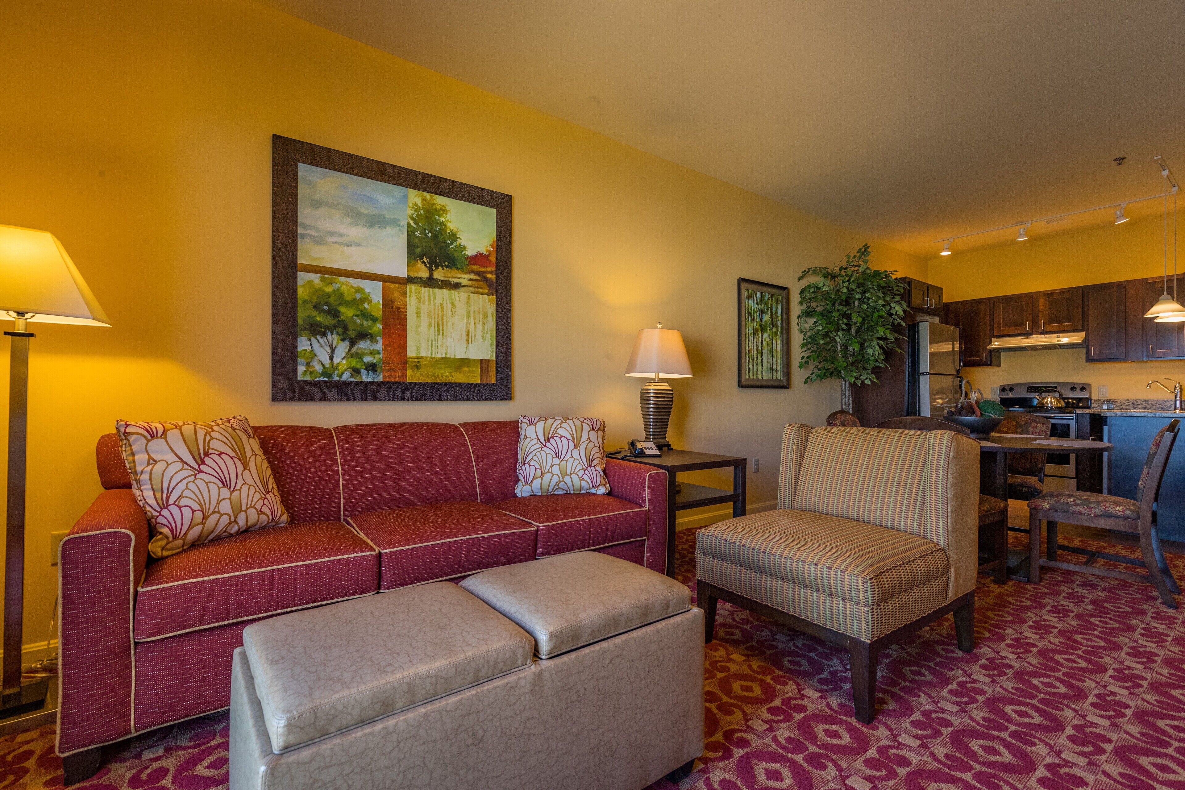One Bedroom Suite | Living area | 42-inch flat-screen TV with cable channels, TV