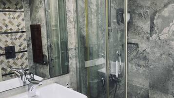 Shower, free toiletries, hair dryer, slippers