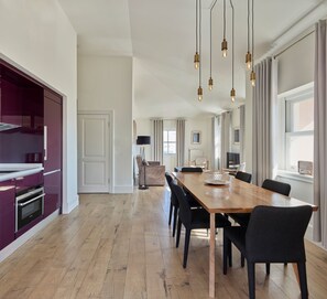 Penthouse, 2 Bedrooms | Living area | 35-inch flat-screen TV with cable channels