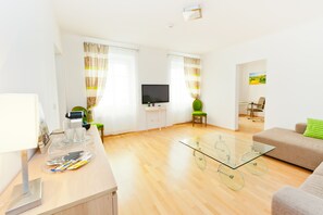 Suite | Woonkamer | Flatscreentelevisie
