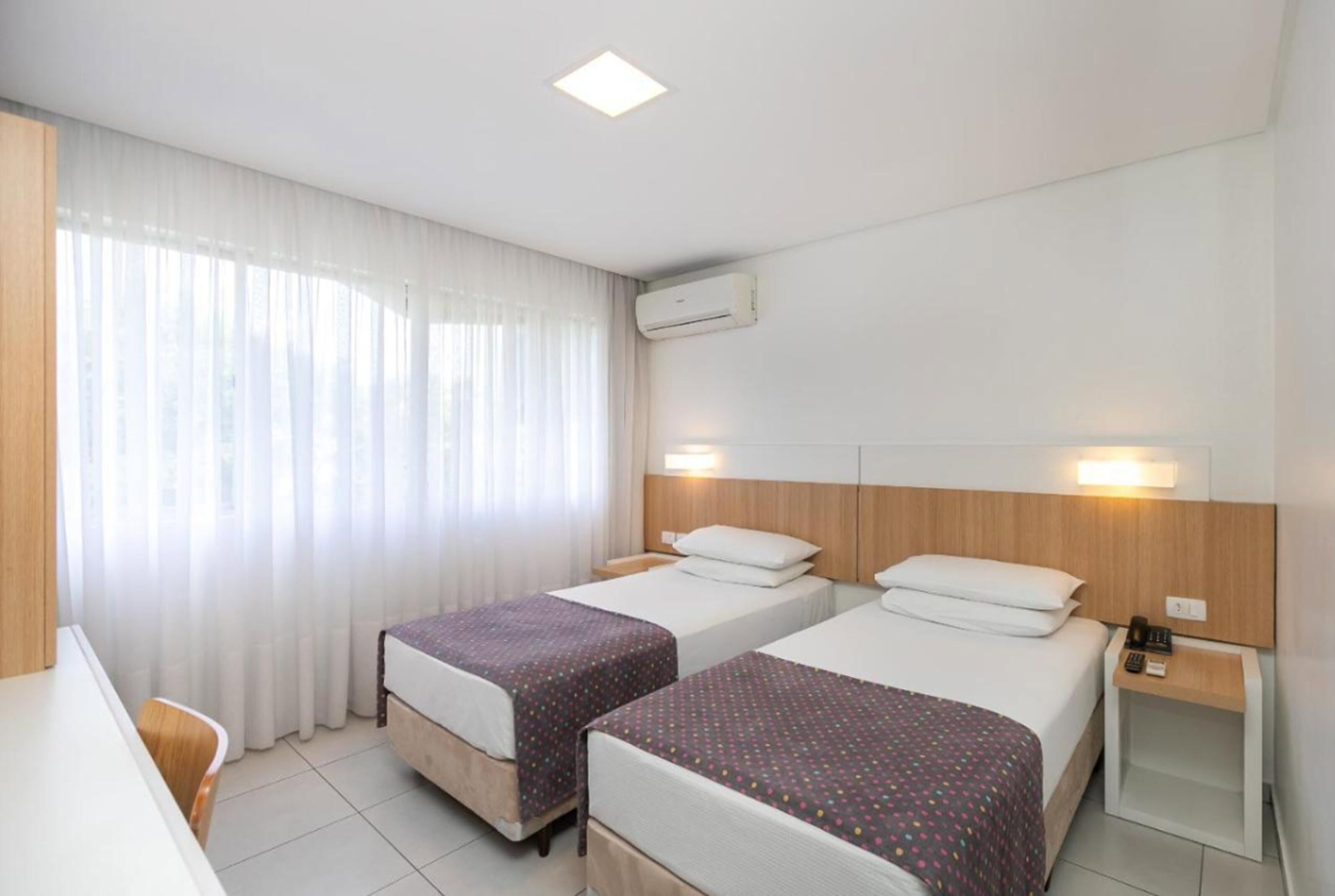 Minibar, desk, laptop workspace, blackout curtains