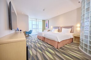 A hotel room with two beds, a desk, a chair, a large window, and a decorative wall panel. - Holiday Inn Express Changzhou Lanling by IHG (Changzhou)