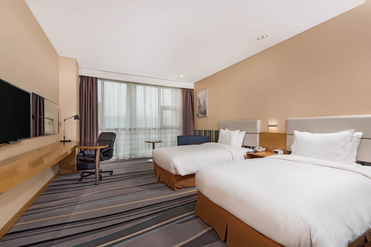Premium bedding, in-room safe, desk, soundproofing