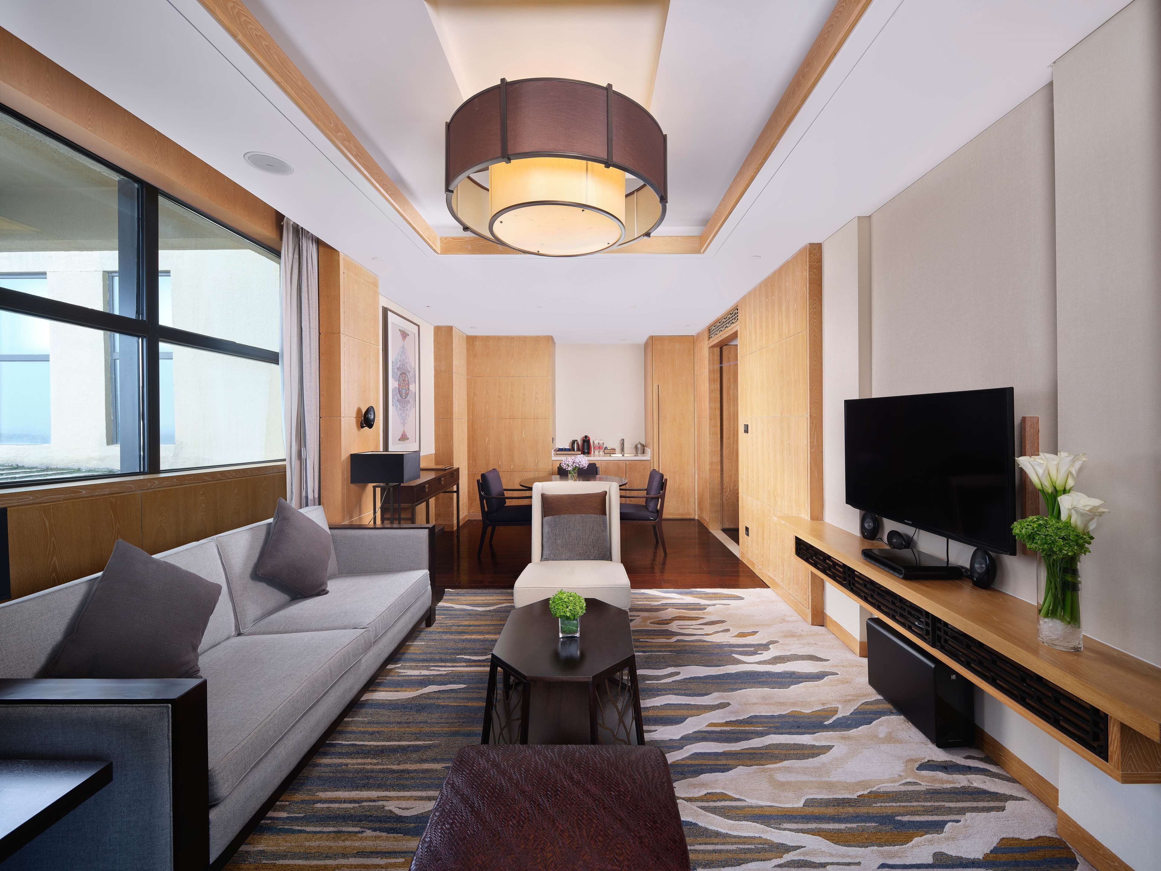 deluxe  suite lake view room | living area | 46-inch led tv with satellite channels, tv