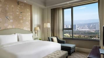 Ropa de cama de alta calidad, minibar, caja fuerte y escritorio