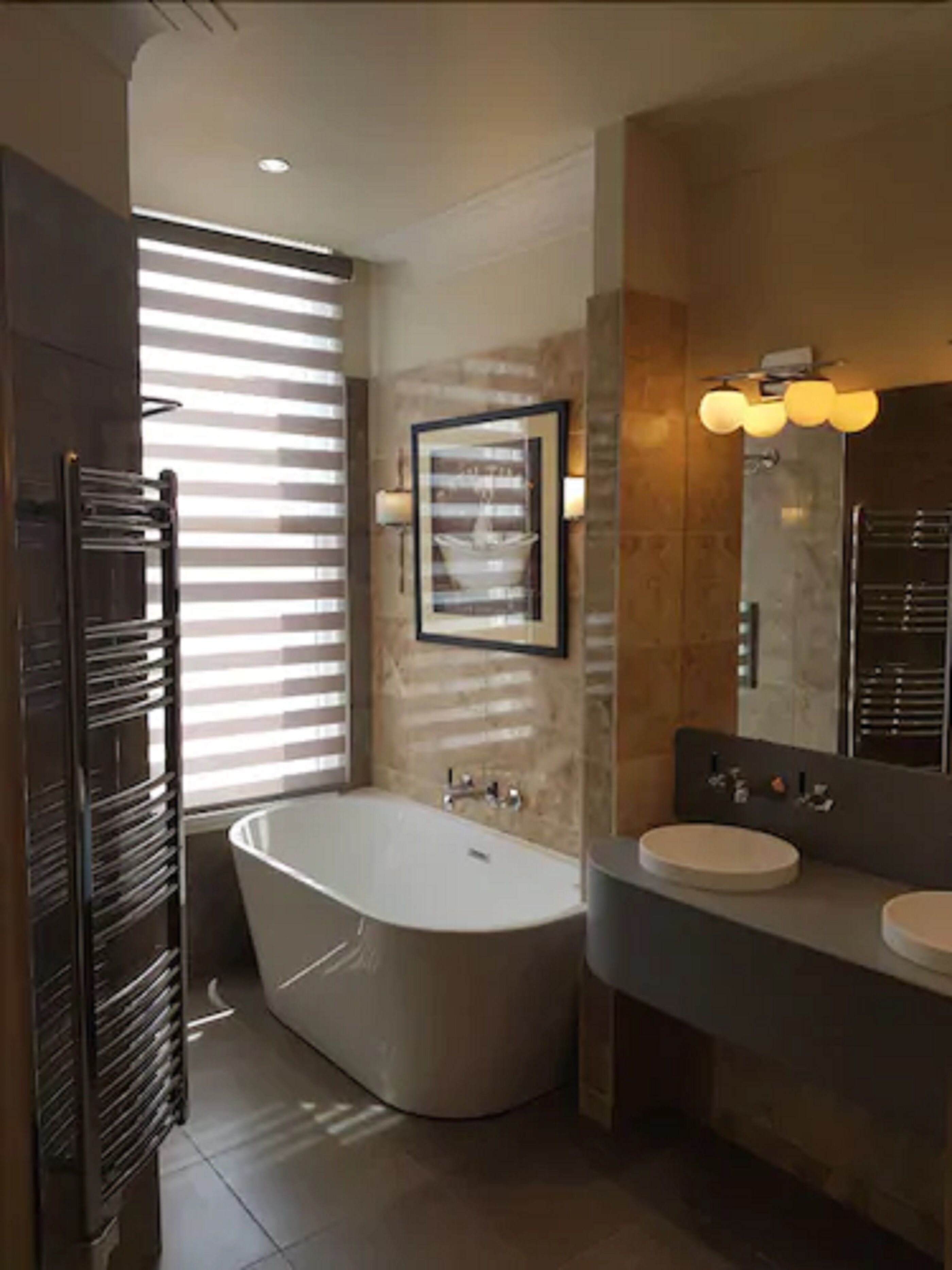 superior suite | bathroom | shower, free toiletries, hair dryer, towels
