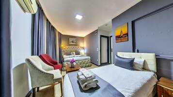 Deluxe-Dreibettzimmer | Bettwäsche aus ägyptischer Baumwolle, hochwertige Bettwaren