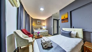 Kamar Triple Deluks | Seprai katun Mesir, seprai premium, dan selimut bulu angsa