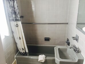 Room, 2 Double Beds | Bathroom | Free toiletries, hair dryer, towels - Rainbow Motel (Mackinaw City)