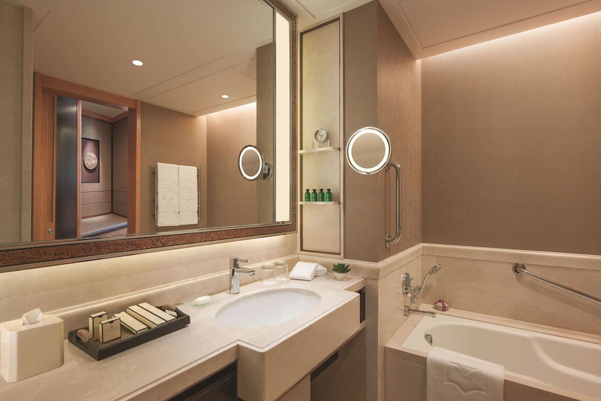 separate bathtub and shower, deep-soaking bathtub, rainfall showerhead