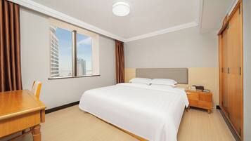 Two Bedrooms Apartment | Premium bedding, desk, blackout drapes, rollaway beds