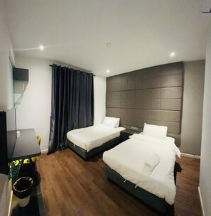 Deluxe Twin kamer, 2 eenpersoonsbedden | Luxe beddengoed, een kluis op de kamer, een bureau, gratis wifi