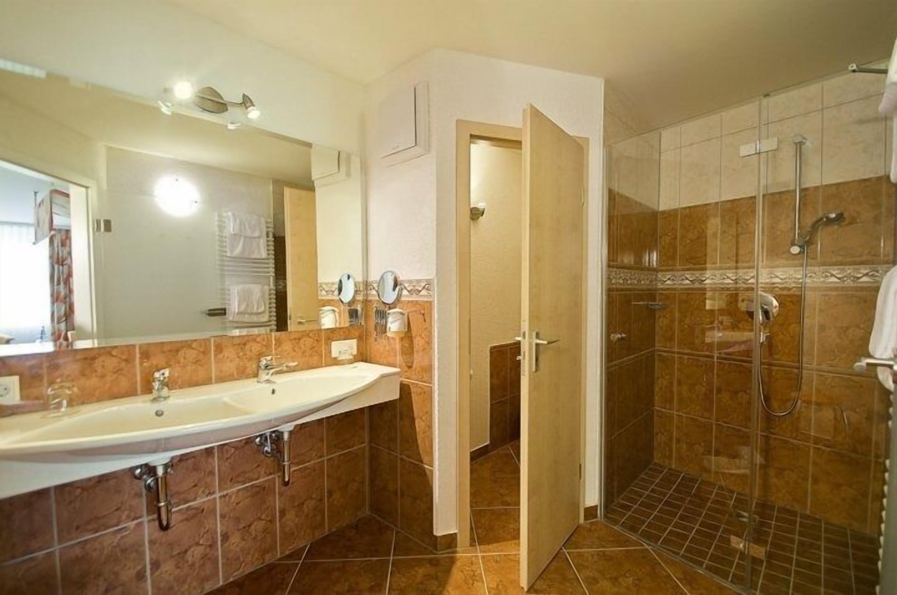 hair dryer, bathrobes, towels