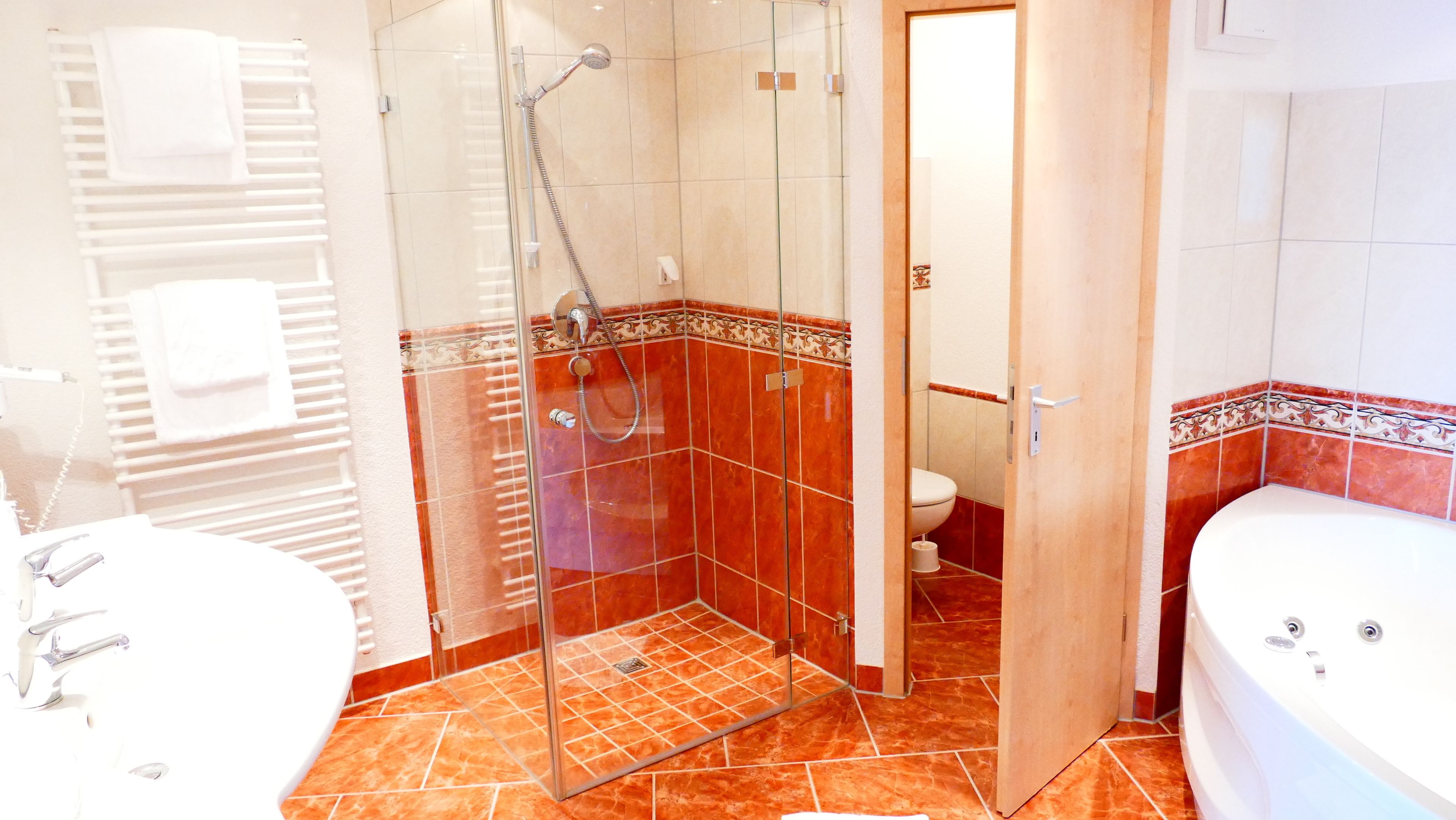 panoramic suite | bathroom | hair dryer, bathrobes, towels
