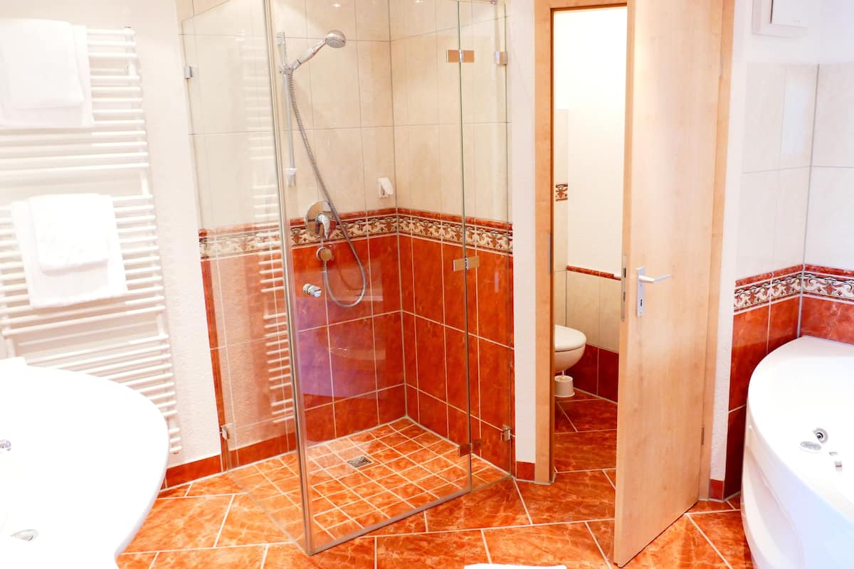 panoramic suite | bathroom | hair dryer, bathrobes, towels