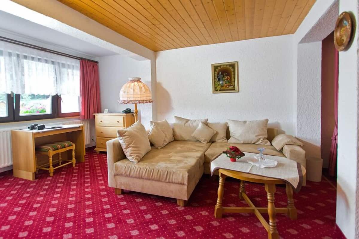 Romantic Double Room | Living area | TV
