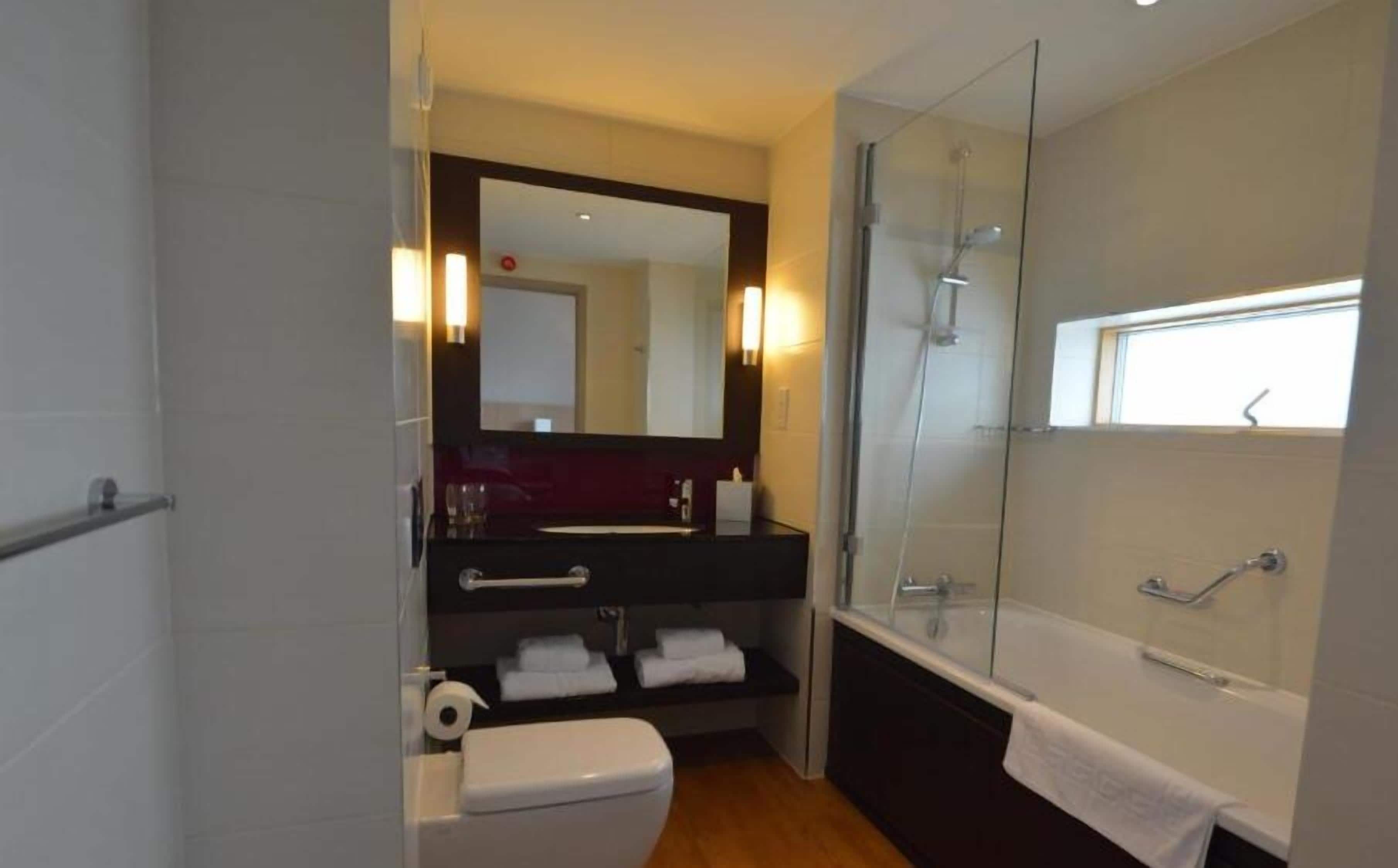 free toiletries, hair dryer, towels, toilet paper