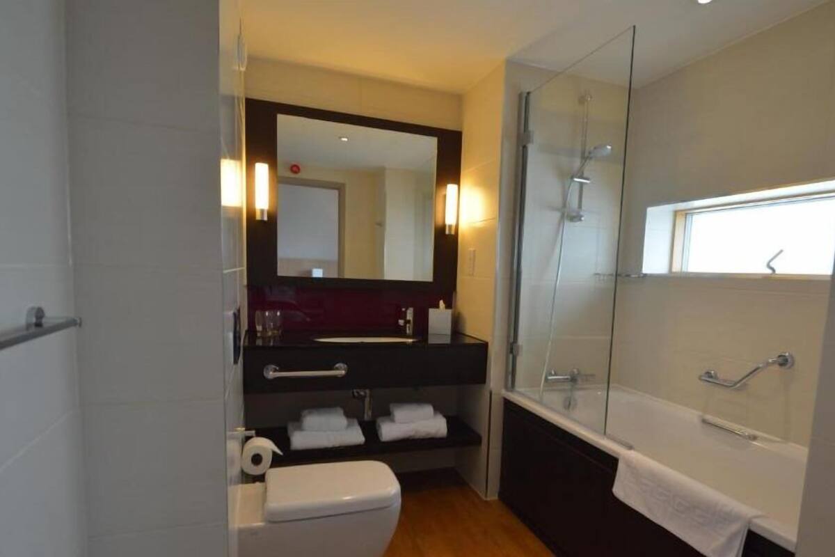 free toiletries, hair dryer, towels, toilet paper