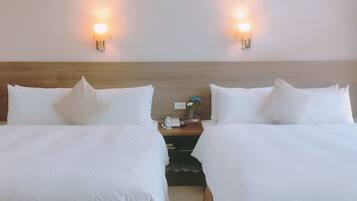 Escrivaninha, cortinas blackout, Wi-Fi de cortesia, roupa de cama