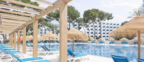 Indoor pool, outdoor pool, pool umbrellas, pool loungers