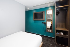 Basic Double Room, No Windows, Ground Floor | Living area | Flat-screen TV