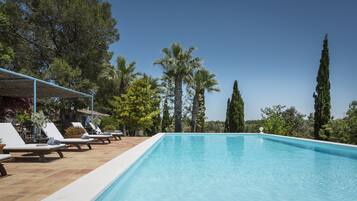 Outdoor pool, pool umbrellas, pool loungers
