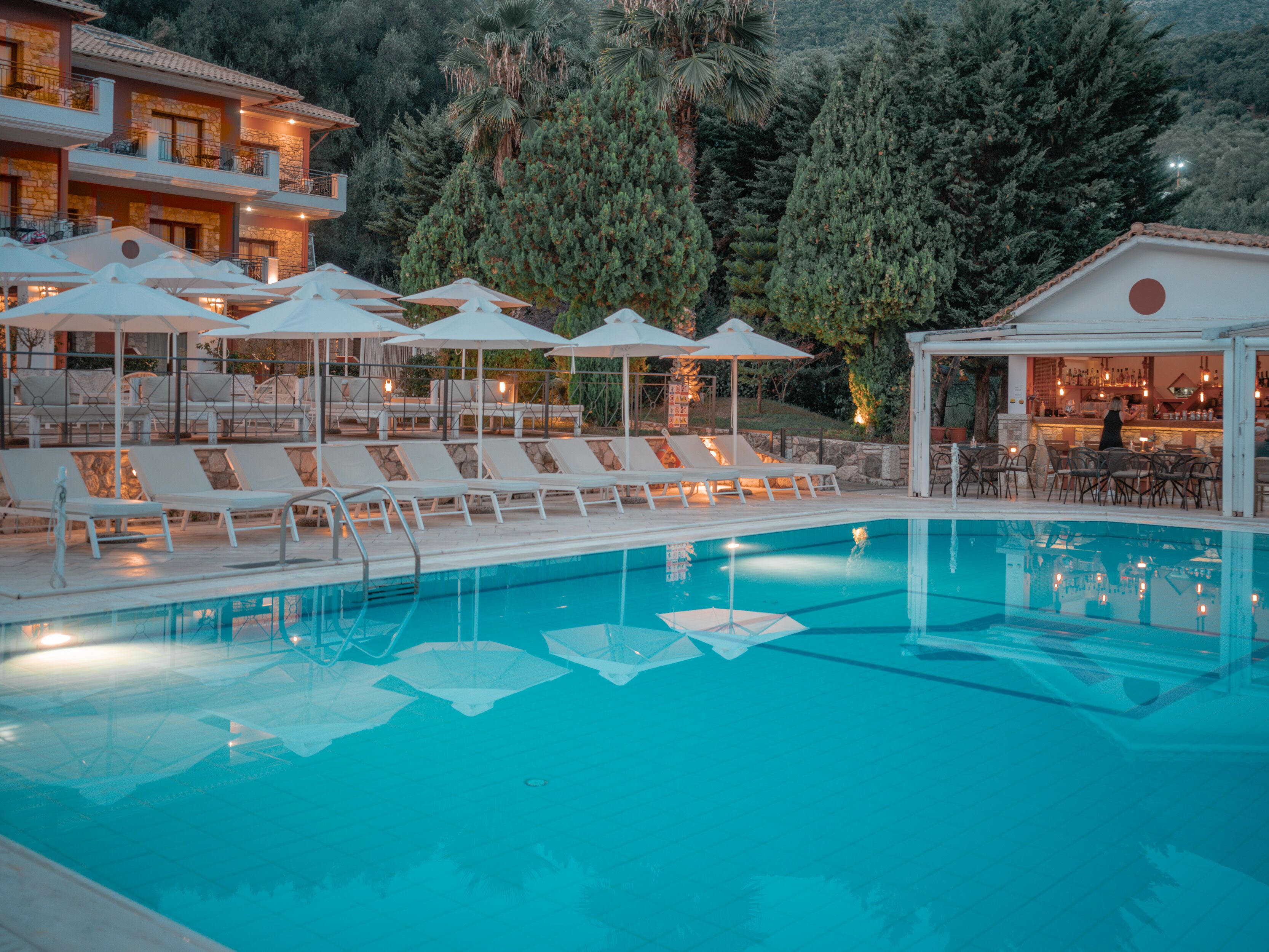 Outdoor pool, pool umbrellas, sun loungers