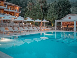 Outdoor pool, pool umbrellas, pool loungers