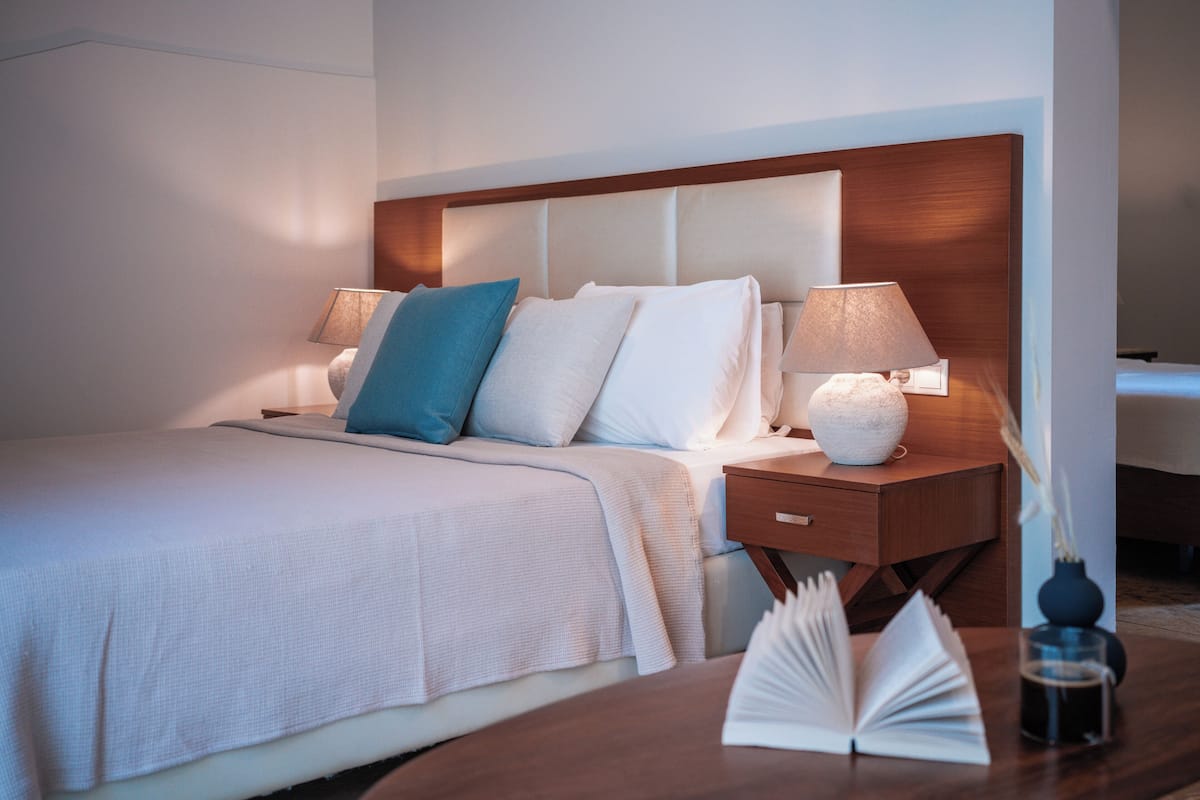 Family Room with Courtyard | 1 bedroom, in-room safe, bed sheets
