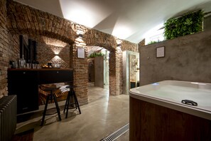 Sauna, bain à remous