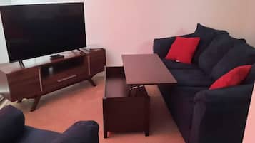 Family Apartment, 1 Bedroom | Living area