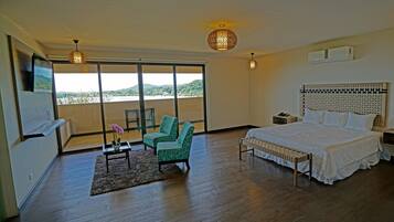 Suite, Balcony, Ocean View | Living area | 50-inch flat-screen TV with cable channels, TV