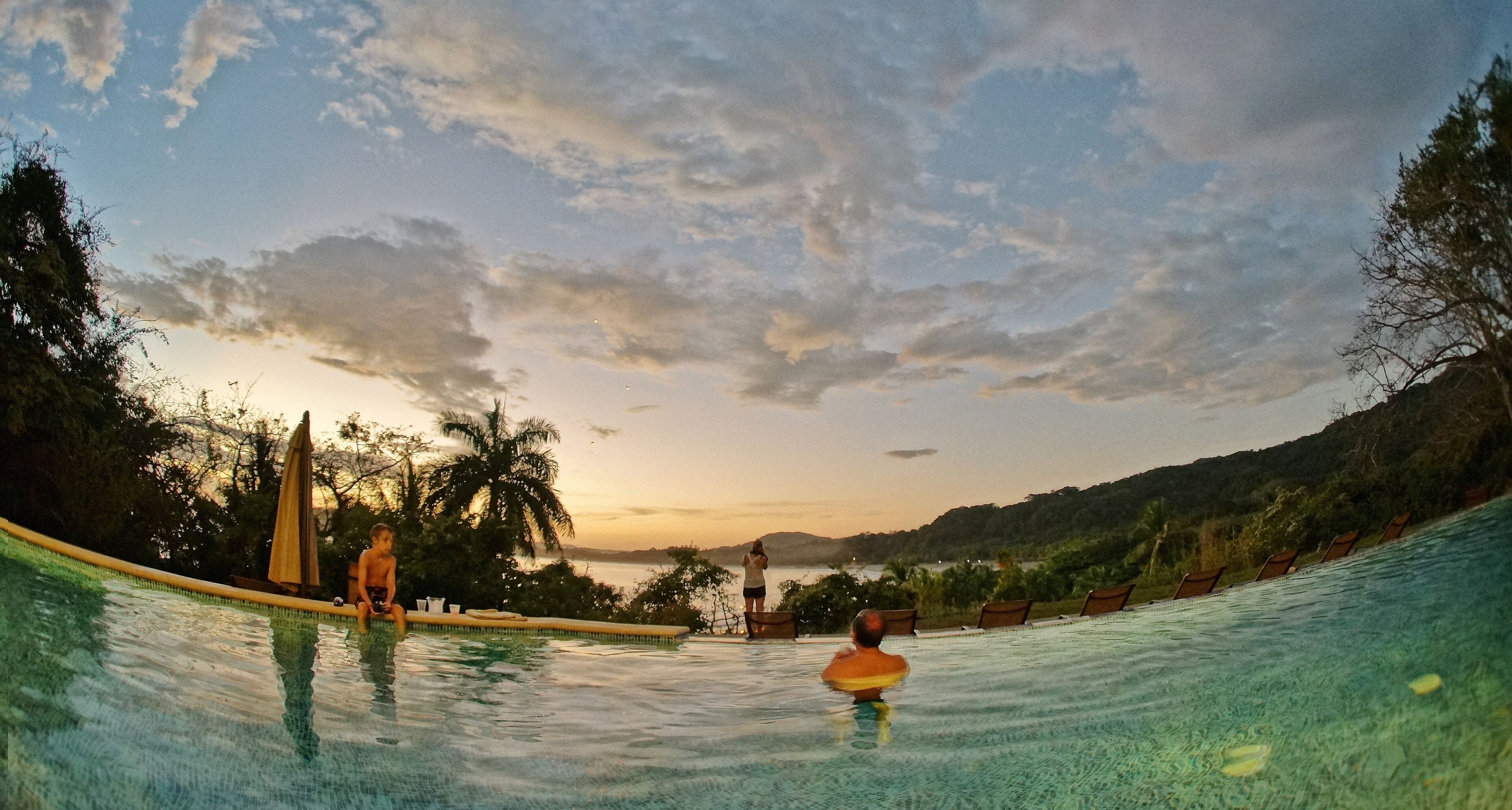 Outdoor pool, open 7:00 AM to 10:00 PM, pool loungers