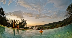 Outdoor pool, open 7:00 AM to 10:00 PM, pool loungers - Nammbú Beachfront Bungalows (Puerto Carrillo)