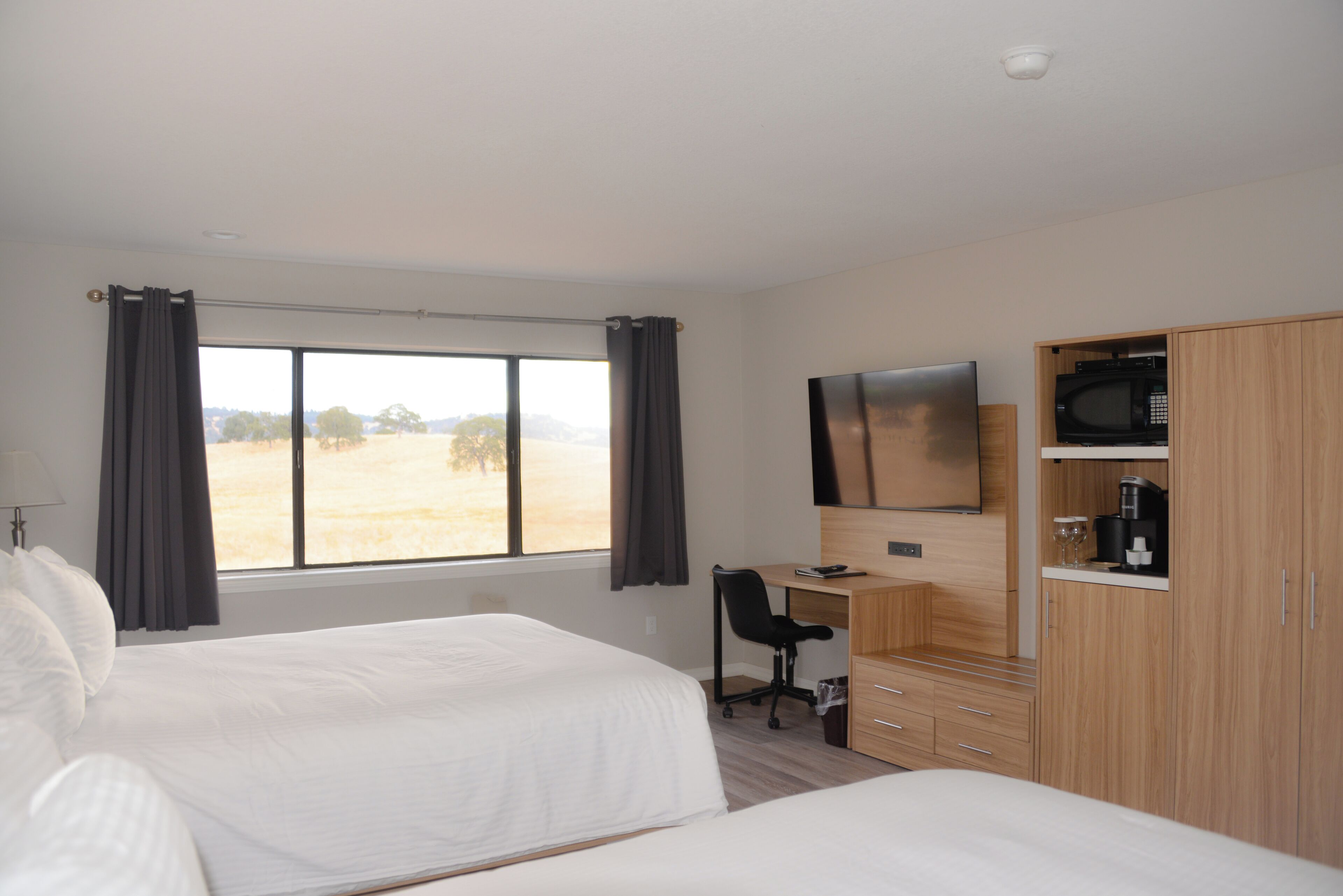 double room, 2 queen beds | desk, iron/ironing board, rollaway beds, free wifi