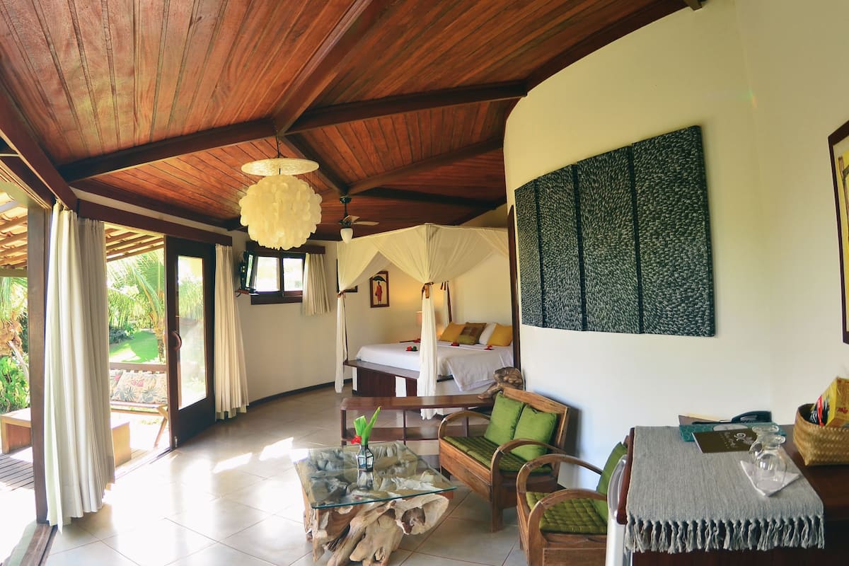 bungalow, ocean view | minibar, in-room safe, individually decorated, blackout curtains