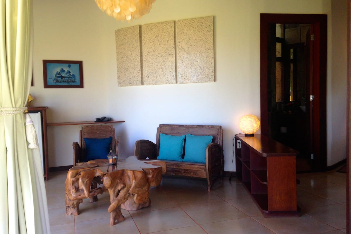 bungalow, garden view | living area | 32-inch led tv with satellite channels, tv