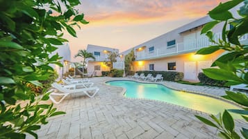 Outdoor pool, open 8:00 AM to 8:00 PM, sun loungers