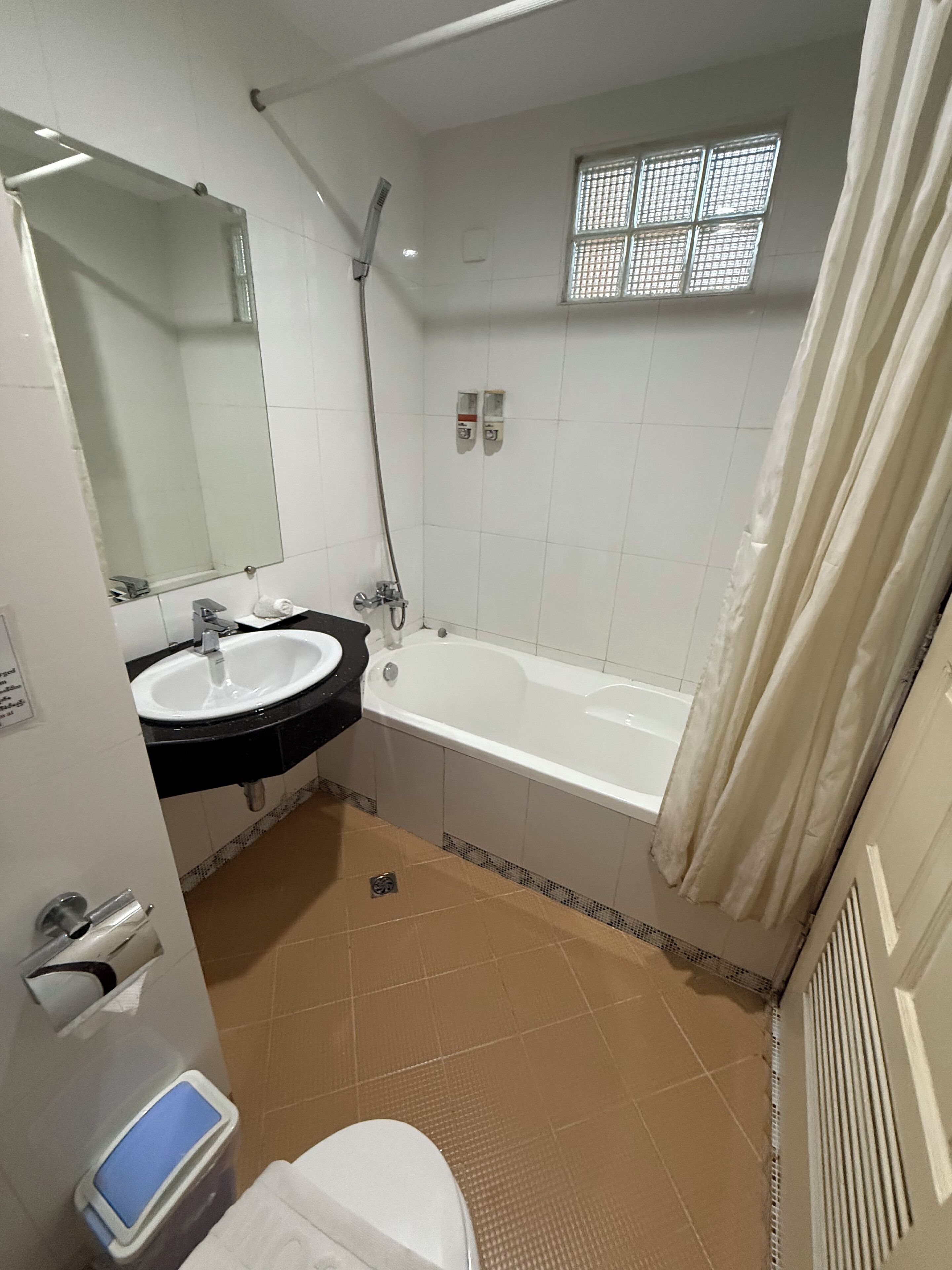 superior double room with city view | bathroom | free toiletries, hair dryer, slippers, towels