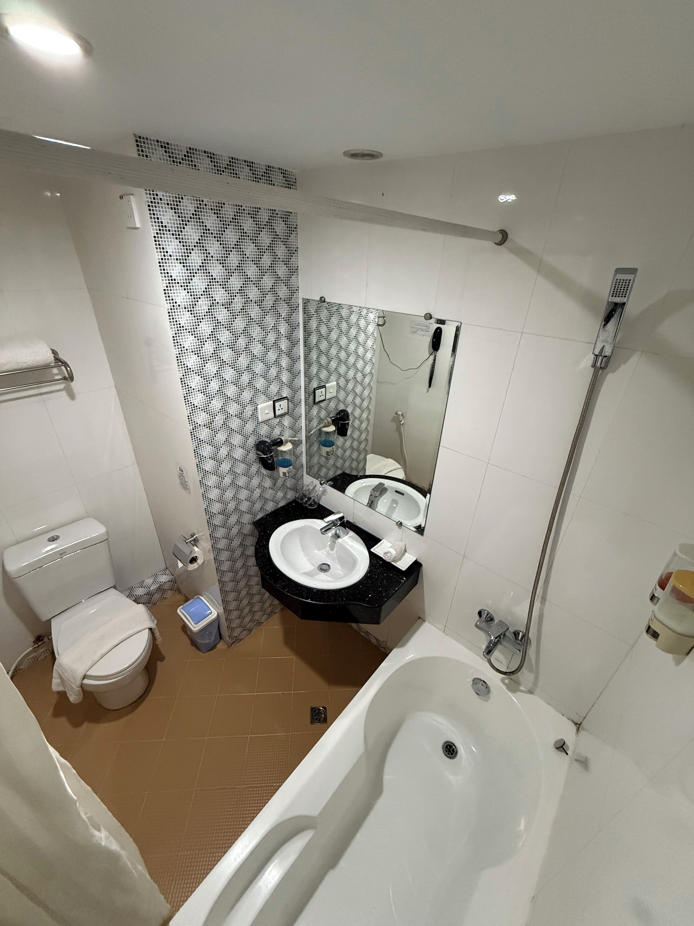 superior double room with city view | bathroom | free toiletries, hair dryer, slippers, towels