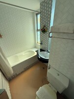 Family Room | Bathroom | Free toiletries, hair dryer, slippers, towels