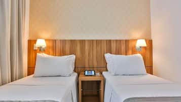 Minibar, desk, blackout drapes, iron/ironing board