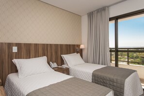 Minibar, desk, blackout drapes, iron/ironing board