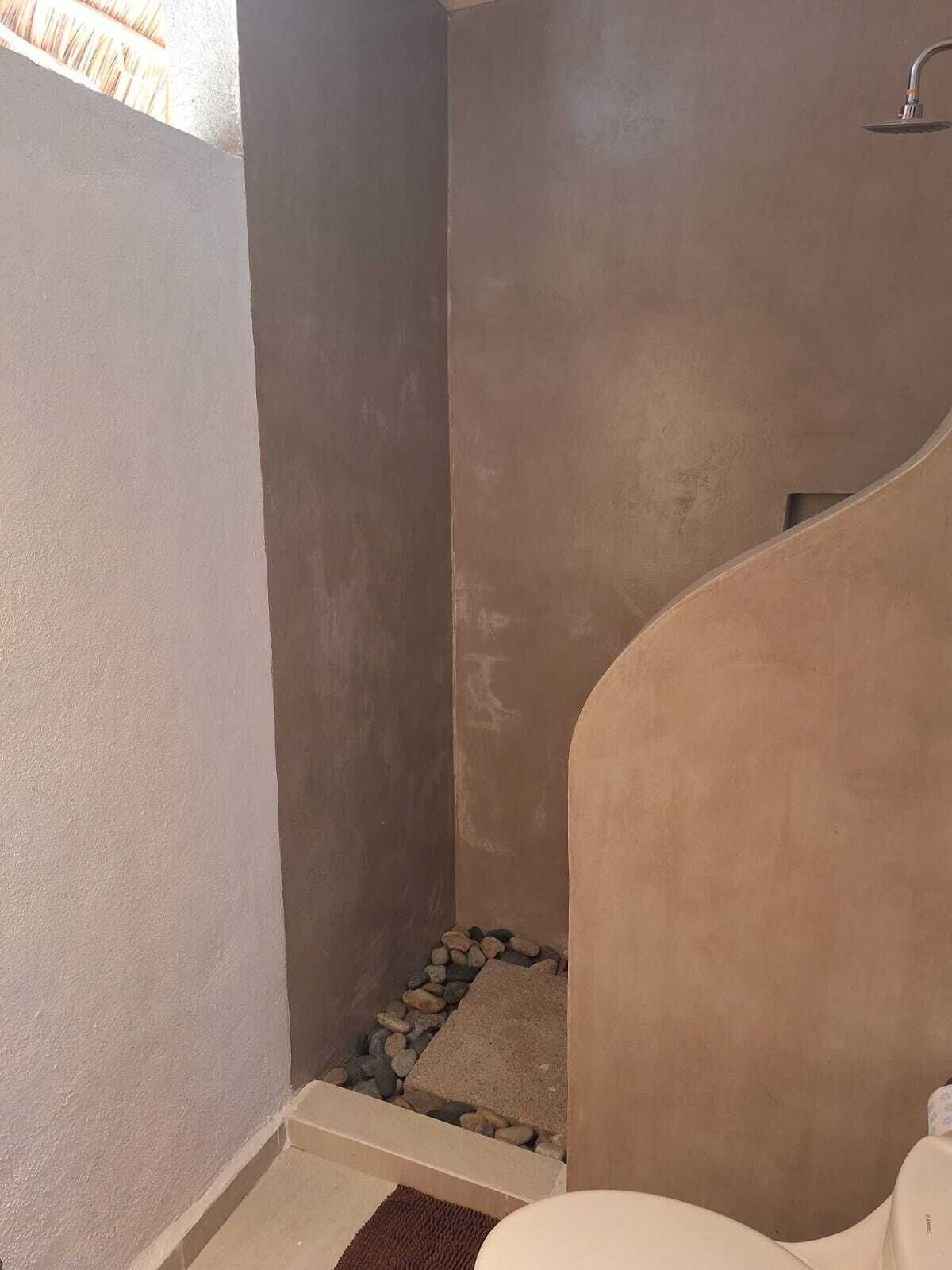 family room with garden view or pool view | bathroom | shower, free toiletries, towels