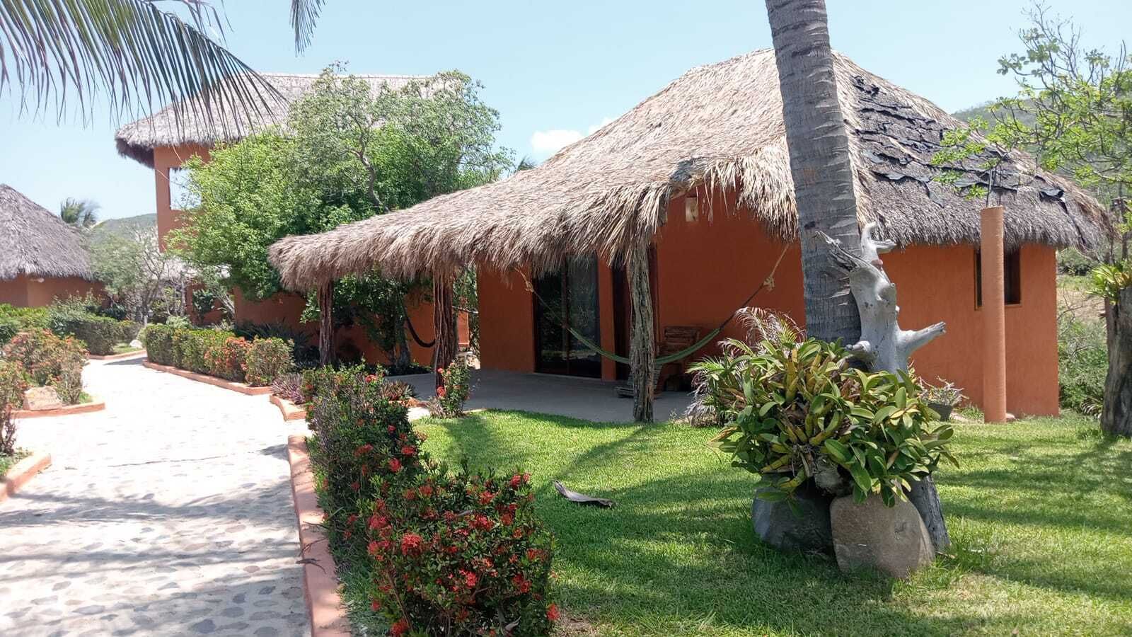 family room with garden view or pool view | terrace/patio