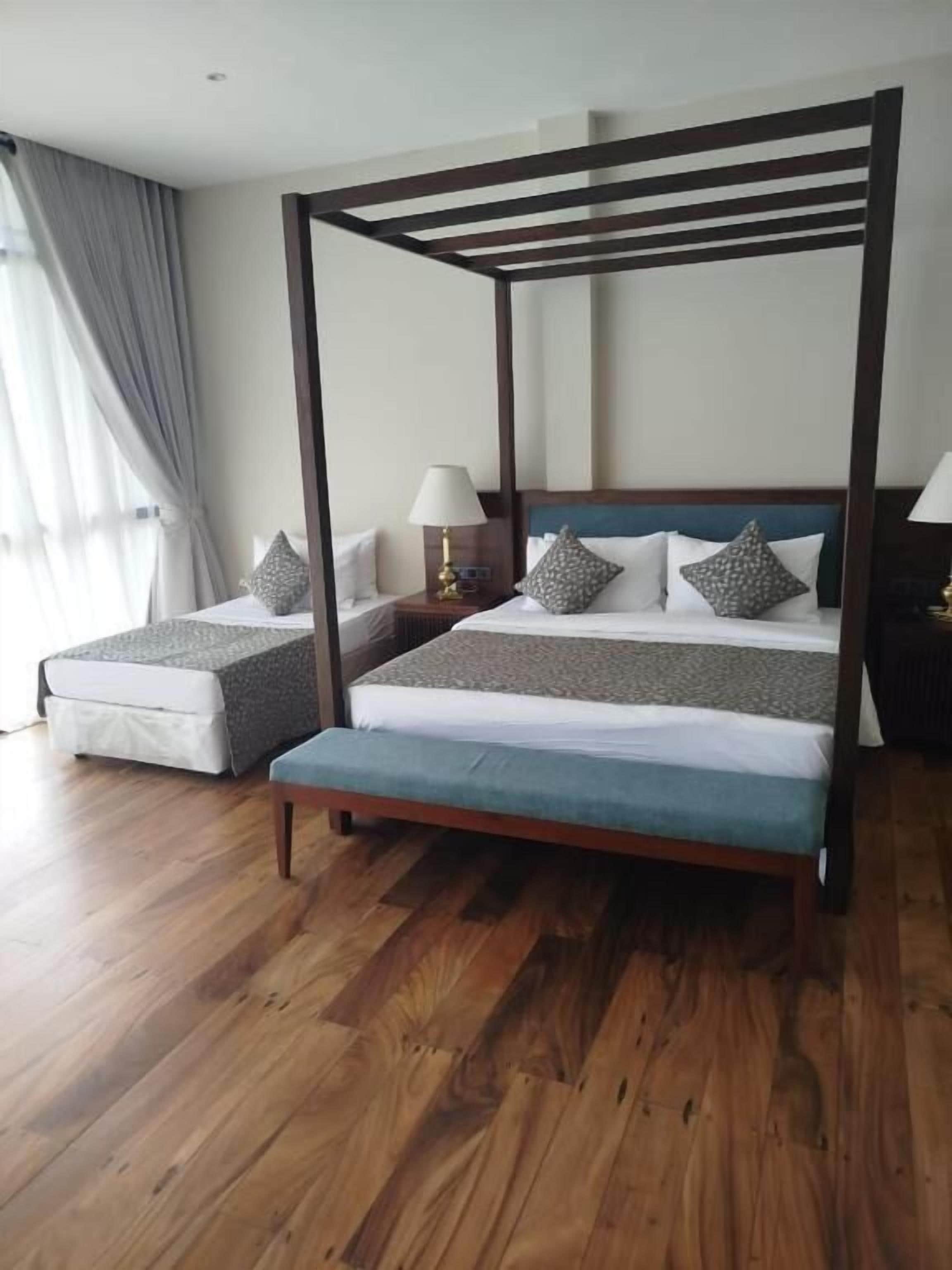 Suite Deluxe | 1 camera, biancheria da letto di alta qualità, minibar