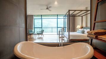 Suite junior | 1 habitación, ropa de cama de alta calidad y minibar