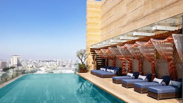 Outdoor pool, open 6:00 AM to 8:00 PM, sun loungers